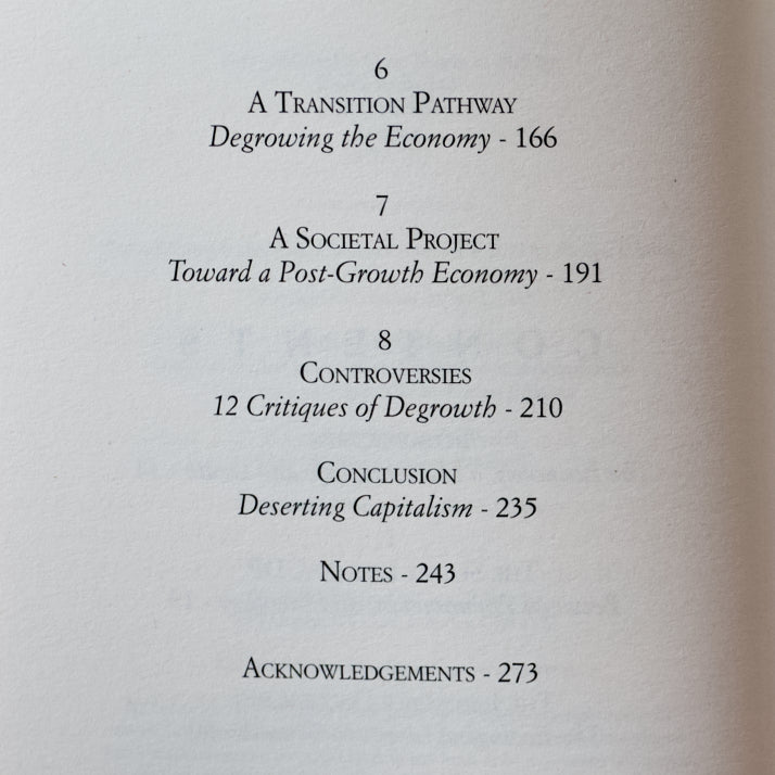 Slow Down or Die: The Economics of Degrowth